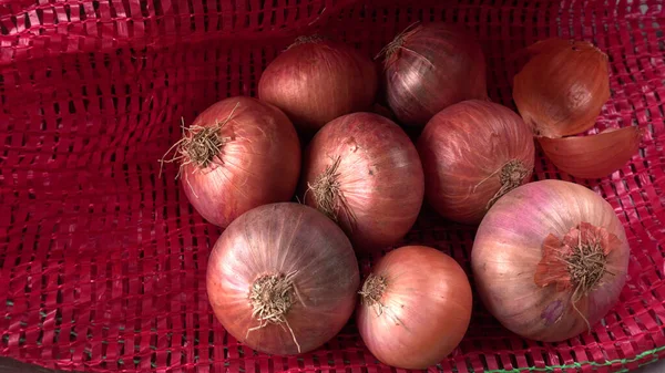 Closeup Shot Pile Red Onions Red Sack — Stock Photo, Image
