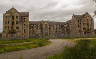 Hartwood Hospital, abandoned psychiatric asylum. Derelict of 3-storey U-plan, Baronial-style building, Shotts, North Lanarkshire, Scotland clipart