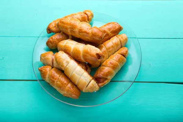 Sausage in the dough, homemade cakes, top view — Stock Photo, Image