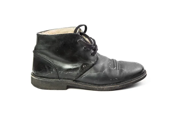 Jedna černá špinavé boot, samostatný — Stock fotografie