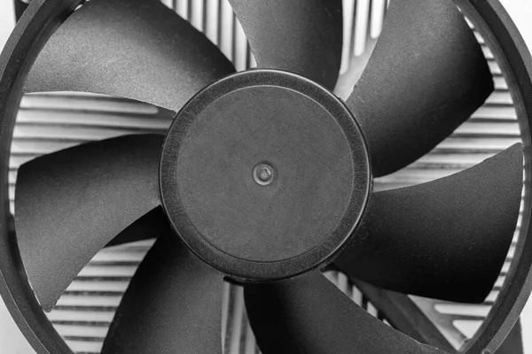 CPU fan on a white background. Cooling ventilation system for computer. Close-up view.