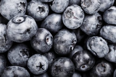Taze yabanmersini arka planı. Doku yaban mersini yakından geliyor. Çeşitli taze yaz meyveleri sağlıklı ve diyet yeme kavramı. Lezzetli yemek..