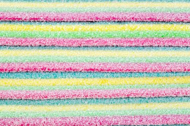 Meyan kökü şekeri. Farklı aromalı tatlı jelibonlar. Şeker arkaplanı.