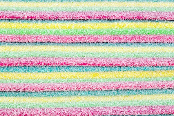 Meyan kökü şekeri. Farklı aromalı tatlı jelibonlar. Şeker arkaplanı.