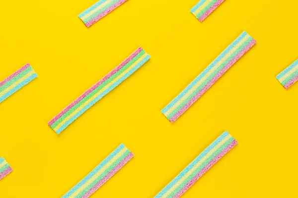 Licorice Candy Sweet Gummy Sticks Different Flavor Yellow Background Top — Stock Photo, Image