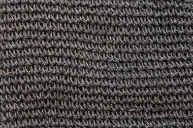 Siyah sentetik ipliğin dokusu. Tekstil konsepti. Soyut arkaplan. Üst görünüm.