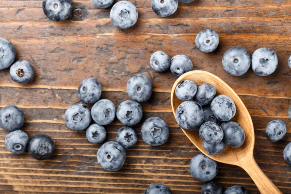 Fresh Blueberries Wooden Spoon Berries Scattered Wooden Table Vegan Vegetarian — Stock Photo, Image