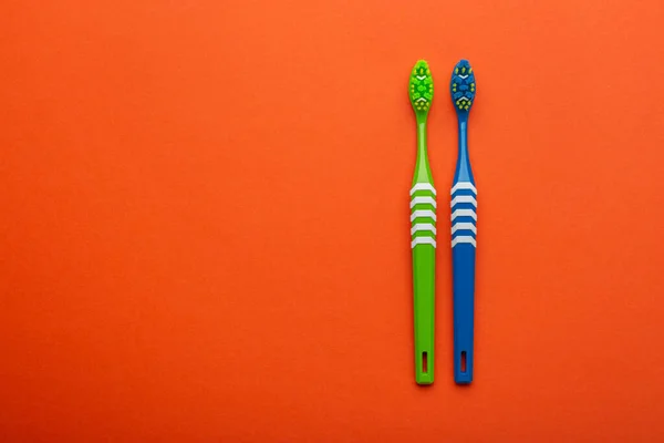 Toothbrushes Orange Background Concept Toothbrush Selection Oral Cavity Care Dental — Stock Photo, Image