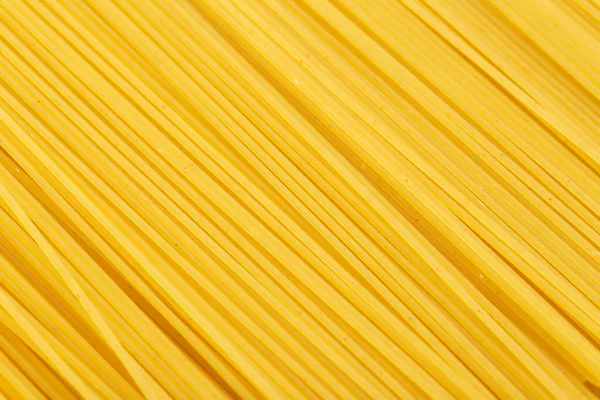 Rauwe Droge Spaghetti Recht Als Achtergrond Bovenaanzicht Ontwerpelement Voorbeeld Van — Stockfoto