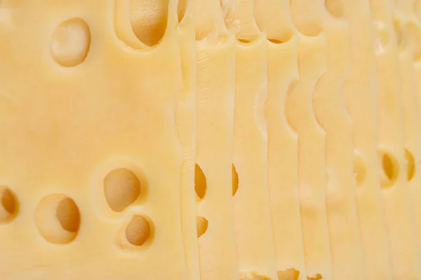チーズの食感 穴の大きいチーズのパターン — ストック写真