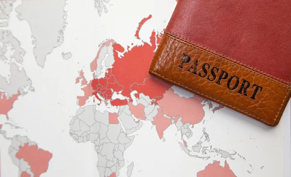 Паспорт на фоновой карте мира — стоковое фото