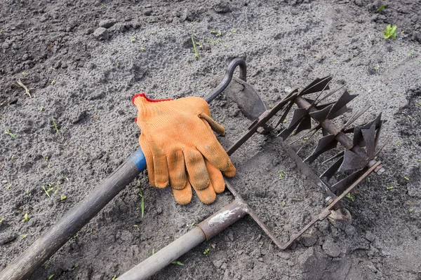 Tool for agriculture lies on the ground. — Stock Photo, Image