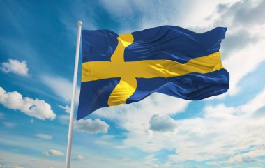 Rüzgarda sallanan büyük bir SWEDEN bayrağı