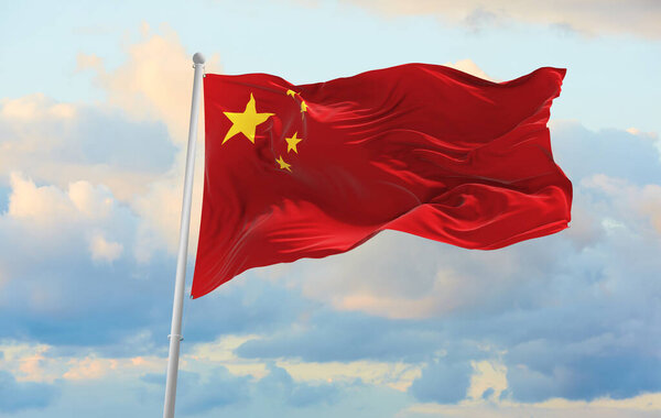 Large chinese flag waving in the wind
