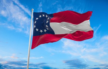 Amerika Birleşik Devletleri bayrağı 1861-1863 gün batımında bulutlu gökyüzü arka planında. Devlet hakkında vatansever bir kavram. 3d illüstrasyon.