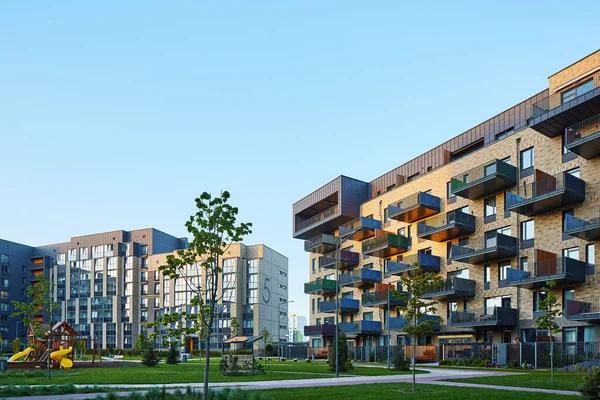 New modern block of flats in green area. residential apartment with flat buildings exterior. luxury house complex. Part of City Real estate property, condo architecture. apartment  insurance concept.