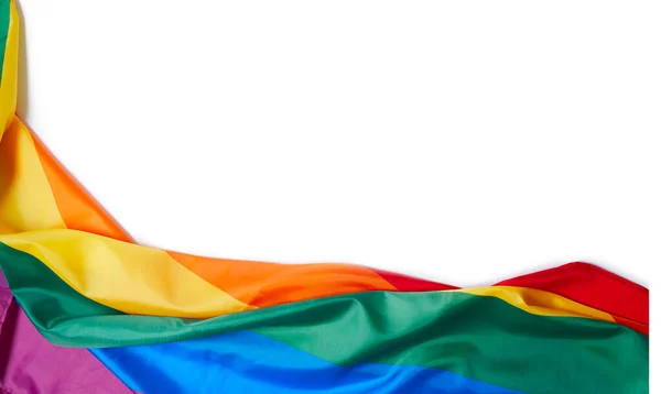 LGBTQ gökkuşağı bayrağı beyaz arkaplanda izole edildi. Köşede bayrak var. Özgürlük ve aşk kavramı. Gurur ayı. Eylemcilik, toplum ve özgürlük kavramı. Boşluğu kopyala..