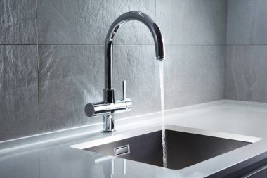 Kitchen water mixer. Water tap made of chrome material, clipart
