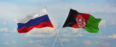 Rusya ve Afganistan 'ın bayrak direkleri rüzgarda dalgalanırken güneşli bir günde gökyüzüne karşı bulutlar. İki ülke arasındaki ilişkiyi, diyaloğu sembolize ediyor. 3d illüstrasyon,