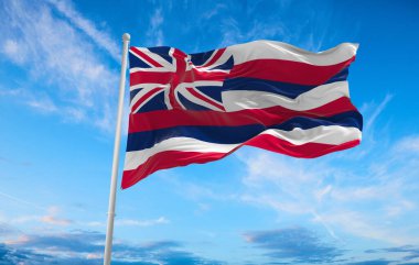 Hawaii bayrağı bulutlu arka planda gün batımında. Devlet hakkında vatansever bir kavram. 3d illüstrasyon,