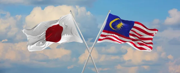 Flags Japan Malaysia Waving Wind Flagpoles Sky Clouds Sunny Day — ストック写真