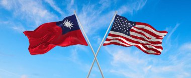 flags of USA and Taiwan waving in the wind on flagpoles against the sky with clouds on sunny day. Symbolizing relationship, dialog between two countries. 3d illustration,