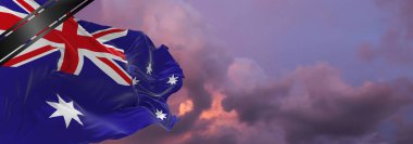 Avustralya ulusal bayrağı ve Matem Kurdelesi. Savaş kurbanlarının anıları, terörist saldırılar, koronavirüs. Bayrağın üzerinde kurbanların anısını onurlandıran siyah cenaze kurdelesi. 3B illüstrasyon.