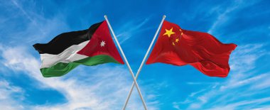 Çin ve Ürdün 'ün bayrak direkleri rüzgarda dalgalanırken güneşli bir günde gökyüzüne karşı bulutlar. İki ülke arasındaki ilişkiyi, diyaloğu sembolize ediyor. 3d illüstrasyon,