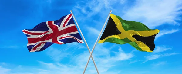 Flags Great Britain Jamaica Waving Wind Flagpoles Sky Clouds Sunny — Stock Photo, Image