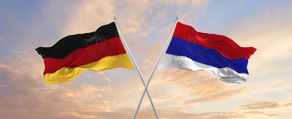 Flaggor Tyskland Och Republiken Srpska Vinka Vinden Flaggstänger Mot Himlen — Stockfoto