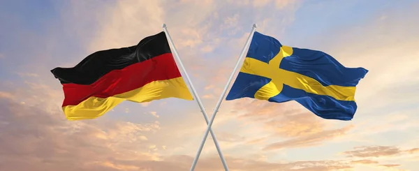 Flaggor Tyskland Och Sverige Vinka Vinden Flaggstänger Mot Himlen Med — Stockfoto