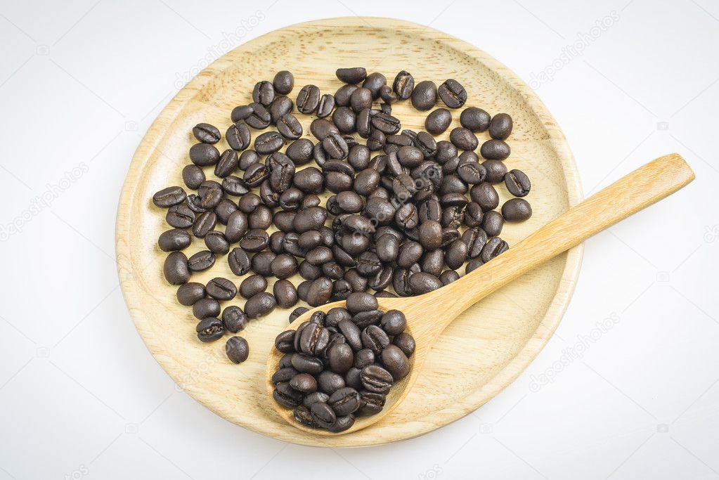 coffee bean in wood plate with Clipping path