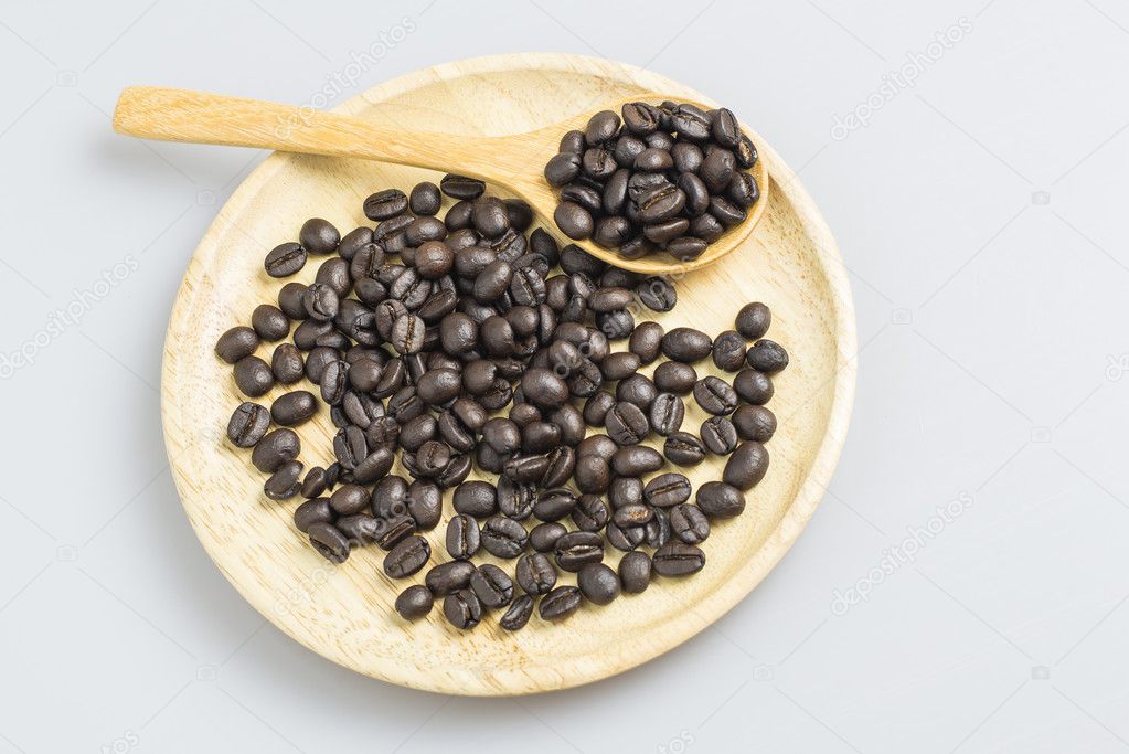 coffee bean in wood plate 