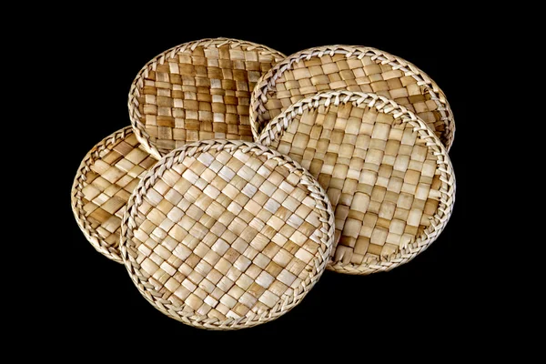 Rattan Coasters on a Black Background — Stock Photo, Image