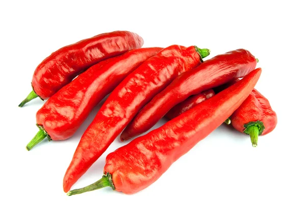 Rode chilipepers op witte achtergrond — Stockfoto