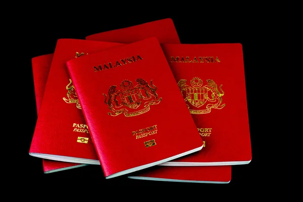 Malaysian Passports on Black Background — Stock Photo, Image