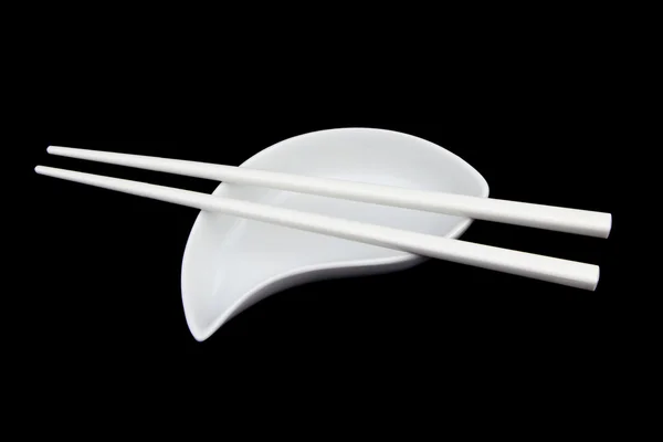 Chopsticks brancos em fundo preto — Fotografia de Stock