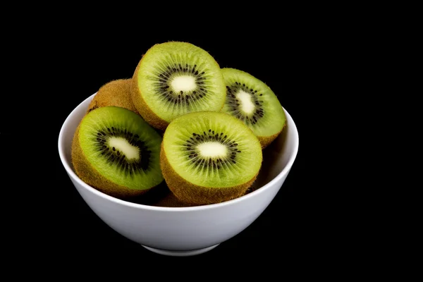 Kiwi Fruit in White Bowl on Black Background — Stock Photo, Image