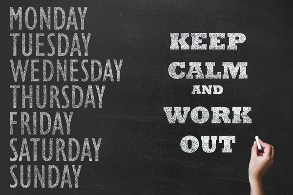 Письменное сообщение 7 day of week on chalk board background and spor — стоковое фото