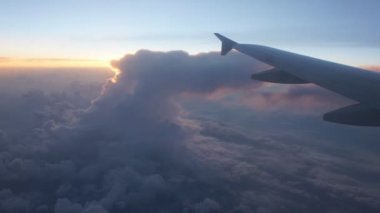 Bulutlar, günbatımı, uçak