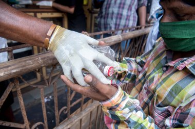 MUMBAI / INDIA - 5 Mayıs 2020: Hükümet sırasındaki Dharavi gecekondularının hava görüntüsü COVID -19 Coronavirus 'a karşı önleyici bir tedbir olarak ülke çapında tecrit altına alındı.