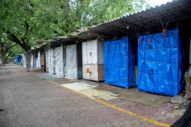 MUMBAI/INDIA - JUNE 17, 2020 : Closed shops at Fashion street, Churchgate during a nationwide lockdown as a preventive measure against the COVID-19 coronavirus.