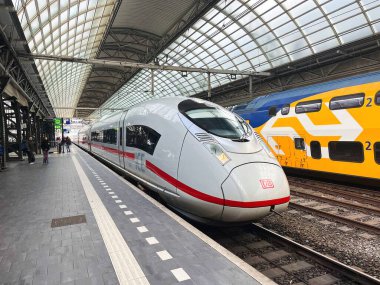 Amsterdam, Netherlands. October 10, 2025. International trains waiting at a platform at the Amsterdam station. High quality photo