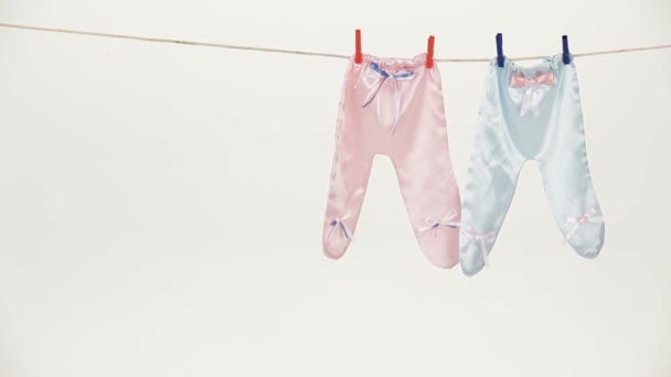 Onesie Drying On A Rope — Stock Video