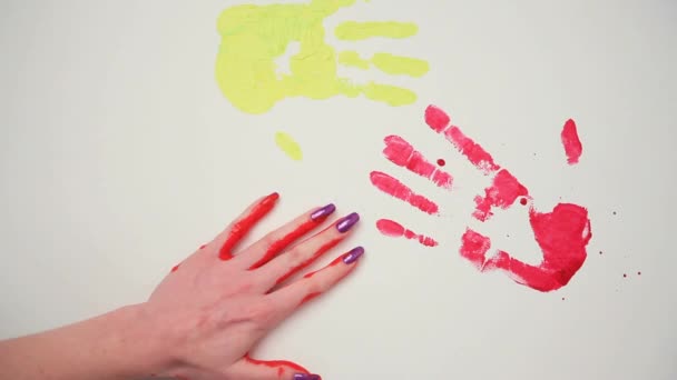 Human Hands Leave Imprints In The Paint On The Wall. — Stock Video