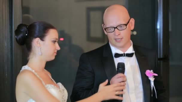 Newlyweds Speaking Into the Microphone — Stock Video