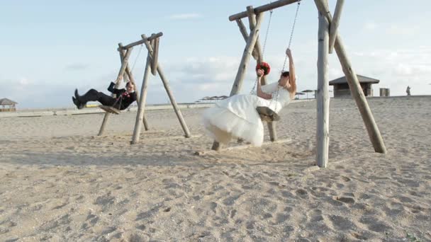 Newlyweds On A Swing — Stock Video