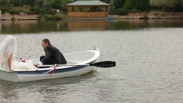 Bride And Groom On A Lake — Stock Video