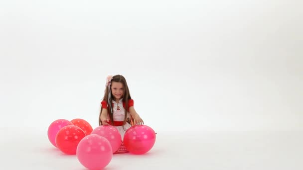 Girl Playing With Balloons — Stock Video