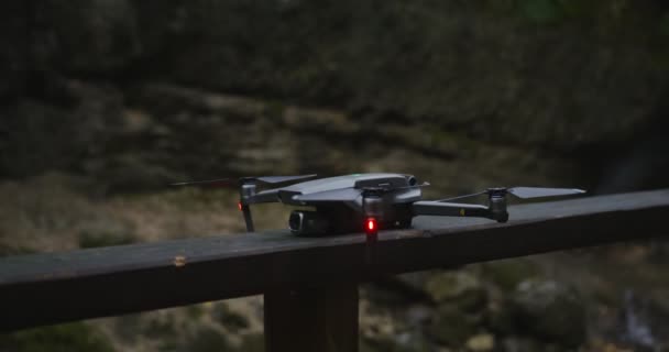 Taking off quadcopter. Modern technology for aerial photography. — Stock Video